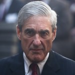 President Barack Obama and FBI Director James Comey xxx at an installation ceremony at FBI Headquarters in Washington, Monday, Oct. 28, 2013. Comey, a former Bush administration official who defiantly refused to go along with White House demands on warrantless wiretapping nearly a decade ago, took over last month for Robert Mueller, who stepped down after 12 years as agency director. (AP Photo/Charles Dharapak)