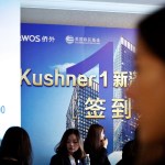 Chinese staffer wait for investors at a reception desk during an event promoting EB-5 investment in a Kushner Companies development at a hotel in Shanghai, China, Sunday, May. 7, 2017. The sister of President Donald Trump’s son-in-law, Jared Kushner, has been courting Chinese investors using a much-criticized federal visa program that provides a path toward obtaining green cards.