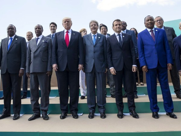 G7 and African leaders pose for a family photo in the Sicilian town of Taormina, Italy, Saturday, May 27, 2017. Leaders of the G7 meet Friday and Saturday, including newcomers Emmanuel Macron of France and Theresa May of Britain in an effort to forge a new dynamic after a year of global political turmoil amid a rise in nationalism. ANSA/ANGELO CARCONI