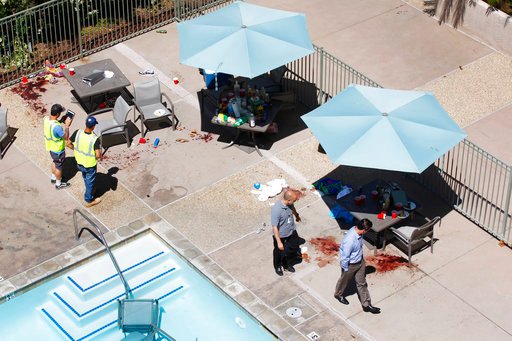 ***MANDATORY CREDIT: K.C. Alfred / San Diego Union-Tribune*** MANDATORY CREDIT***, NO SALES, NO FOREIGN, NO MAGS, NO TELEVISION, NO INTERNET***LOS ANGELES DAILY NEWS OUT, ORANGE COUNTY REGISTER OUT, INLAND VALLEY DAILY BULLETIN OUT, LA OPINION OUT.SAN DIEGO, CA - MAY 1, 2017 - Remnants of a birthday party in the pool area at the La Jolla Crossroads apartments shows the chaotic scene after a shooting took place on Sunday. Peter Selis, 49, open fired on the party at the crowded pool. Seven people were wounded. (Photo by K.C. Alfred/The San Diego Union-Tribune)