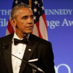 Former President Barack Obama addresses an audience after being presented with the 2017 Profile in Courage award during ceremonies at the John F. Kennedy Presidential Library and Museum Sunday, May 7, 2017, in Boston. (AP Photo/Steven Senne)