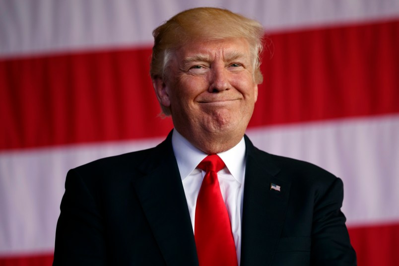 President Donald Trump smiles as he is introduced to speak to U.S. military troops and their families at Naval Air Station Sigonella, Saturday, May 27, 2017, in Sigonella, Italy. (AP Photo/Evan Vucci)