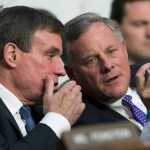 Senate Intelligence Committee Vice Chairman Mark Warner, D-Va., left, confers with Sen. Richard Burr, R-N.C., chairman of the Intelligence Committee as the panel questions top national security chiefs about the  gathering of intelligence on foreign agents, on Capitol Hill in Washington, Wednesday, June 7, 2017. (AP Photo/J. Scott Applewhite)