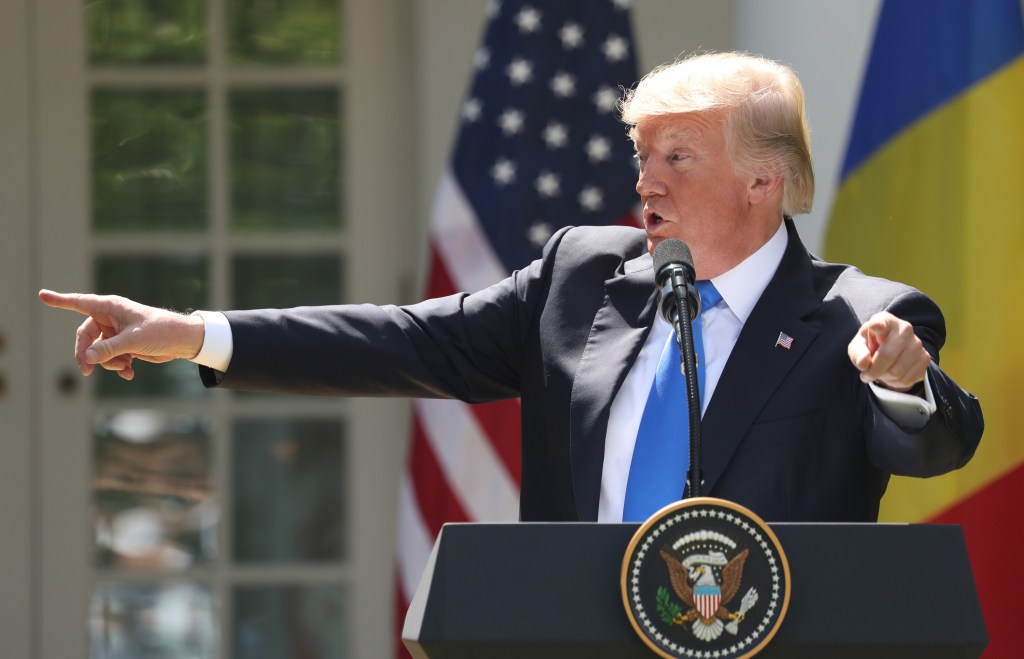 President Donald Trump, accompanied by Romanian President Klaus Werner Iohannis, speaks during a news conference in the Rose Garden at the White House, Friday, June 9, 2017, in Washington. (AP Photo/Andrew Harnik)