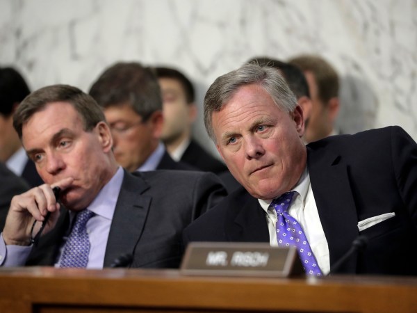 Sen. Richard Burr, R-N.C., right, chairman of the Senate Select Committee on Intelligence, and Vice Chairman Mark Warner, D-Va., left, listen as Attorney General Jeff Sessions testifies before the Senate Select Committee on Intelligence about his role in the firing of FBI Director James Comey and the investigation into contacts between Trump campaign associates and Russia, on Capitol Hill in Washington, Tuesday, June 13, 2017. (AP Photo/J. Scott Applewhite)