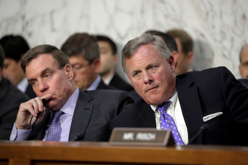 Sen. Richard Burr, R-N.C., right, chairman of the Senate Select Committee on Intelligence, and Vice Chairman Mark Warner, D-Va., left, listen as Attorney General Jeff Sessions testifies before the Senate Select Committee on Intelligence about his role in the firing of FBI Director James Comey and the investigation into contacts between Trump campaign associates and Russia, on Capitol Hill in Washington, Tuesday, June 13, 2017. (AP Photo/J. Scott Applewhite)