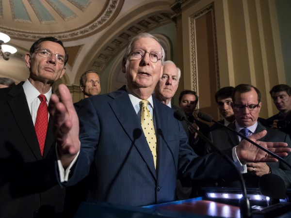 Senate Majority Leader Mitch McConnell, R-Ky., joined by, from left, Sen. John Barrasso, R-Wyo., Sen. John Thune, R-S.D., and Majority Whip John Cornyn, R-Texas, meets with reporters following a closed-door strategy session, at the Capitol in Washington, Tuesday, June 20, 2017. Sen. McConnell says Republicans will have a "discussion draft" of a GOP-only bill scuttling former President Barack Obama's health care law by Thursday. (AP Photo/J. Scott Applewhite)