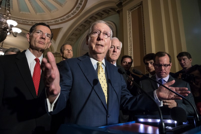 Senate Majority Leader Mitch McConnell, R-Ky., joined by, from left, Sen. John Barrasso, R-Wyo., Sen. John Thune, R-S.D., and Majority Whip John Cornyn, R-Texas, meets with reporters following a closed-door strategy session, at the Capitol in Washington, Tuesday, June 20, 2017. Sen. McConnell says Republicans will have a "discussion draft" of a GOP-only bill scuttling former President Barack Obama's health care law by Thursday. (AP Photo/J. Scott Applewhite)