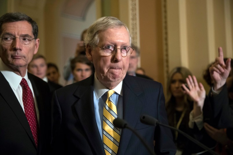 Senate Majority Leader Mitch McConnell, R-Ky., joined by Sen. John Barrasso, R-Wyo., left, tells reporters he is delaying a vote on the Republican health care bill while GOP leadership works toward getting enough votes, at the Capitol in Washington, Tuesday, June 27, 2017. In a bruising setback, Senate Republican leaders are delaying a vote on their prized health care bill until after the July 4 recess, forced to retreat by a GOP rebellion that left them lacking enough votes to even begin debating the legislation, two sources said Tuesday. (AP Photo/J. Scott Applewhite)