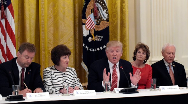 President Donald Trump, center, speaks as he meets with Republican senators on health care in the East Room of the White House in Washington, Tuesday, June 27, 2017. Seated with him, from left, are Sen. Dean Heller, R-Nev., Sen. Susan Collins, R-Maine, Sen. Lisa Murkowski, R-Alaska, and Sen. Orrin Hatch, R-Utah. (AP Photo/Susan Walsh)