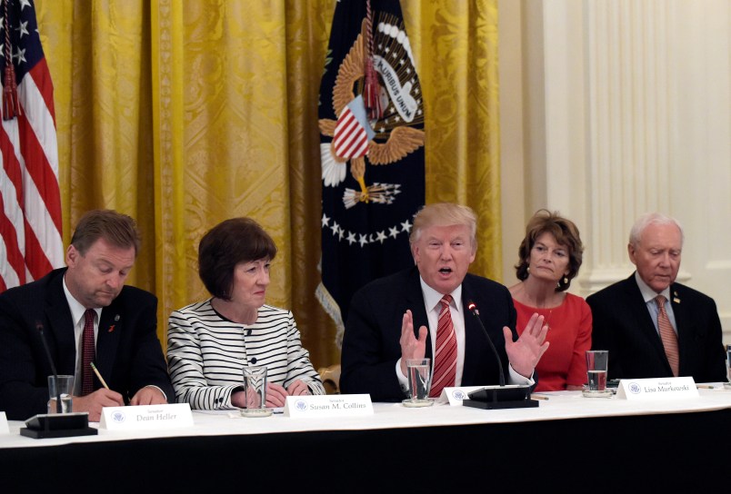 President Donald Trump, center, speaks as he meets with Republican senators on health care in the East Room of the White House in Washington, Tuesday, June 27, 2017. Seated with him, from left, are Sen. Dean Heller, R-Nev., Sen. Susan Collins, R-Maine, Sen. Lisa Murkowski, R-Alaska, and Sen. Orrin Hatch, R-Utah. (AP Photo/Susan Walsh)