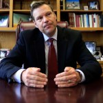 Secretary of State Kris Kobach talks with a reporter in his office in Topeka, Kan., Wednesday, May 17, 2017. (AP Photo/Orlin Wagner)