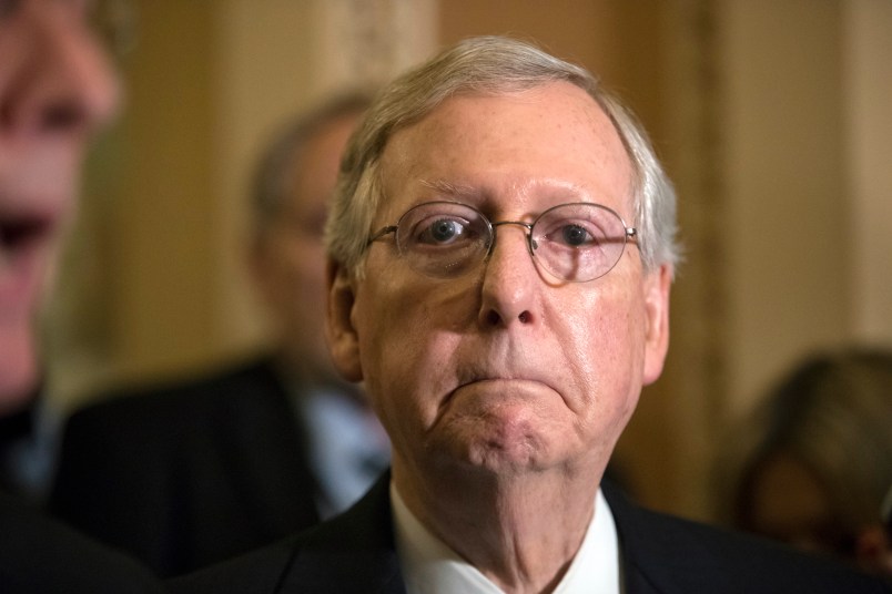 Senate Majority Leader Mitch McConnell, R-Ky., tells reporters he is delaying a vote on the Republican health care bill while GOP leadership works toward getting enough votes, at the Capitol in Washington, Tuesday, June 27, 2017. In a bruising setback, Senate Republican leaders are delaying a vote on their prized health care bill until after the July 4 recess, forced to retreat by a GOP rebellion that left them lacking enough votes to even begin debating the legislation, two sources said Tuesday. (AP Photo/J. Scott Applewhite)