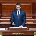 French President Emmanuel Macron speaks during a special congress gathering both houses of parliament (National Assembly and Senate) in the palace of Versailles, outside Paris, Monday, July 3, 2017. Macron will lay out his political, security and diplomatic priorities at an extraordinary joint session of parliament at the chateau of Versailles. (Eric Ferferberg/Pool Photo via AP)