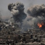 *** Alternative crop os XFD101 *** Airstrikes continue to target Islamic State positions on the edge of the Old City a day after Iraq’s prime minister declared "total victory" in Mosul, Iraq, Tuesday, July 11, 2017. (AP Photo/Felipe Dana)