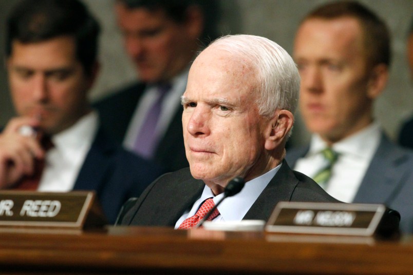 Senate Armed Services Committee Chairman Sen. John McCain, R-Ariz. listens on Capitol Hill in Washington, Tuesday, July 11, 2017, during the committee's confirmation hearing for Nay Secretary nominee Richard Spencer.  (AP Photo/Jacquelyn Martin)
