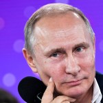 Russian President Vladimir Putin listens to a question during  a meeting with the students while visiting the Sirius Educational Centre for Gifted Children in the Black Sea resort of Sochi, Russia, Friday, July 21, 2017. (Alexei Nikolsky, Sputnik, Kremlin Pool Photo via AP)