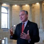 Sen. Tim Kaine, a Virginia Democrat, responds to questions about the poison gas attacks and ongoing “war crimes” in Syria, during a television news interview on Capitol Hill in Washington, Wednesday, April 5, 2017. Kaine blasted blasted President Donald Trump for relying on his criticism of former President Obama’s approach to Syria now that he’s in charge, adding, “He’s got to put on his big boy pants and own up to the job.”   (AP Photo/J. Scott Applewhite)
