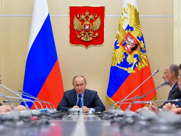Russian President Vladimir Putin,  center, chairs a meeting of the Commission for Military Technology Cooperation at the Novo-Ogaryovo residence outside Moscow, Russia, Thursday, July 6, 2017.  (Alexei Druzhinin, Sputnik,  Kremlin Pool Photo via AP)