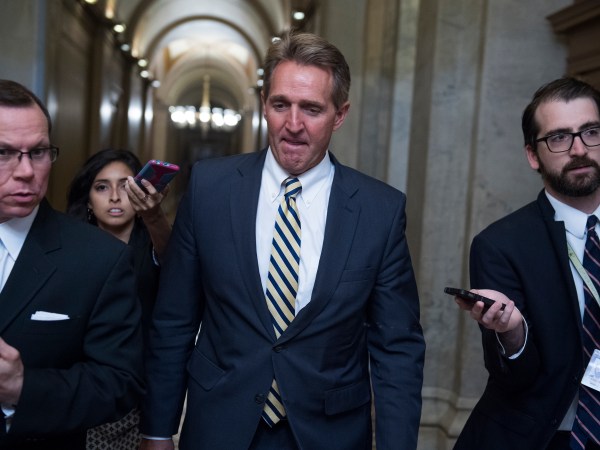 UNITED STATES - JULY 13: Sen. Jeff Flake, R-Ariz., talks with reporters in the Capitol after a meeting where Senate Republicans' unveiled and updated health care bill on July 13, 2017. (Photo By Tom Williams/CQ Roll Call)
