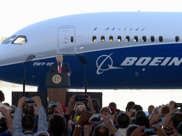 President Donald Trump speaks in front of the Boeing 787 Dreamliner while visiting the Boeing South Carolina facility in North Charleston, S.C., Friday, Feb. 17, 2017. Trump is visiting Boeing before heading to his Mar-a-Lago estate in Palm Beach, Fla., for the weekend. (AP Photo/Susan Walsh)