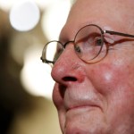 Senate Majority Leader Mitch McConnell of Ky., smiles as he talks to reporters on Capitol Hill in Washington, Tuesday, July 25, 2017, after Vice President Mike Pence broke a 50-50 tie to start debating Republican legislation to tear down much of the Obama health care law. (AP Photo/Jacquelyn Martin)
