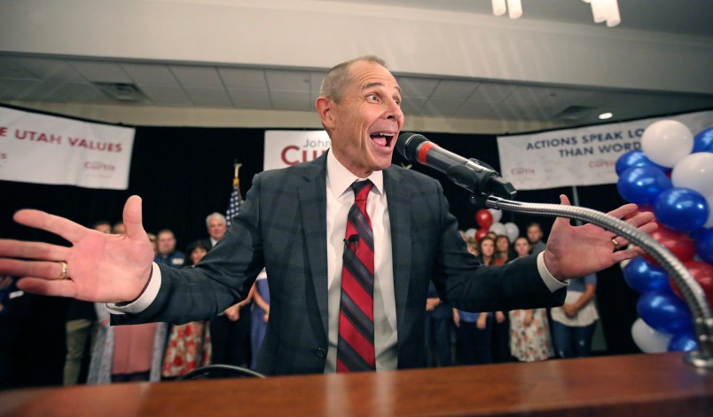 Provo Mayor John Curtis celebrates after winning Utah's Republican primary to become the overwhelming favorite to fill the U.S. House seat vacated by Jason Chaffetz  Tuesday, Aug. 15, 2017, in Provo, Utah. Curtis of Provo, defeated former state lawmaker Chris Herrod and business consultant Tanner Ainge, son of Boston Celtics president Danny Ainge. (AP Photo/Rick Bowmer)