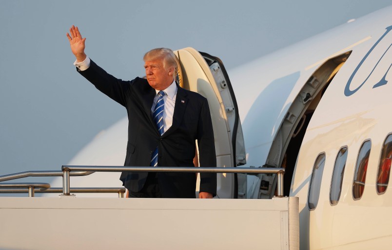 President Donald Trump first lady Melania Trump and son Barron Trump board Air Force One at Morristown Municipal Airport, Sunday, Aug. 20, 2017 in Morristown, N.J., for the return flight to Washington. (AP Photo/Pablo Martinez Monsivais)
