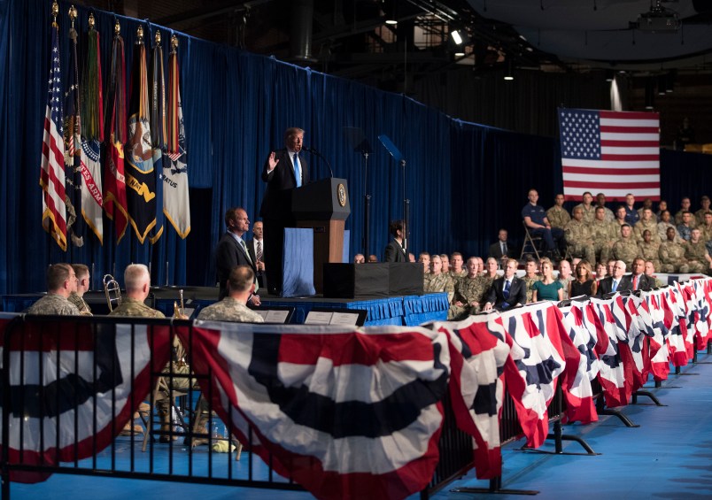 President Donald Trump speaks at Fort Myer in Arlington Va., Monday, Aug. 21, 2017, during a Presidential Address to the Nation about a strategy he believes will best position the U.S. to eventually declare victory in Afghanistan. (AP Photo/Carolyn Kaster)