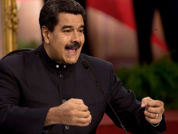 Venezuela's President Nicolas Maduro speaks at a news conference with International press in Caracas, Venezuela, Tuesday, Aug. 22, 2017. Maduro spoke about the next regional elections in the country and the bad relations with the Government of the United State. (AP Photo/Ariana Cubillos)