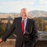 Cecil Andrus poses for a photo Friday, Oct. 14, 2001, at his office in Boise, Idaho. Andrus, governor of Idaho from 1971-1977 and 1987-1995, and Secretary of the Interior from 1977-1981 during the Carter administration, is the subject of a memoir by Andrus’ press secretary Chris Carlson, which calls Andrus “Idaho’s greatest governor.” Andrus takes issue with the title. (AP Photo/Idaho Statesman, Katherine Jones)    MANDATORY CREDIT