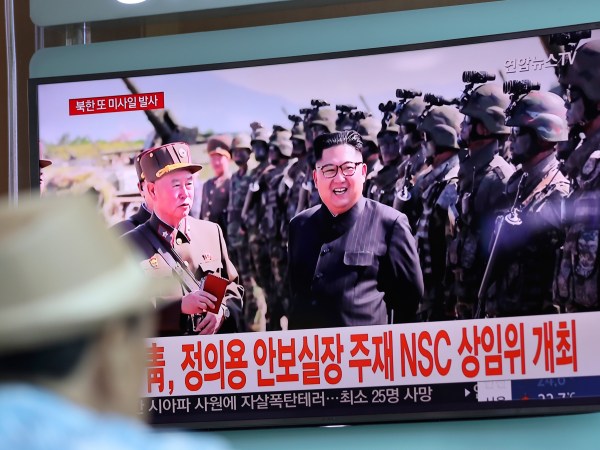 A man watches a TV screen showing a local news program reporting on North Korea's missiles with an image of North Korea's leader Kim Jong Un at the Seoul Train Station in Seoul, South Korea, Saturday, Aug. 26, 2017. Three North Korea short-range ballistic missiles failed on Saturday, U.S. military officials said, which, if true, would be a temporary setback to Pyongyang's rapid nuclear and missile expansion. The banners read "South Korean Presidential Office, National Security Director Chung Eui-yong chaired a National Security Council meeting." (AP Photo/Lee Jin-man)