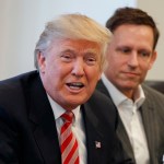 Apple CEO Tim Cook, right, and PayPal founder Peter Thiel, center, listen as President-elect Donald Trump speaks during a meeting with technology industry leaders at Trump Tower in New York, Wednesday, Dec. 14, 2016. (AP Photo/Evan Vucci)