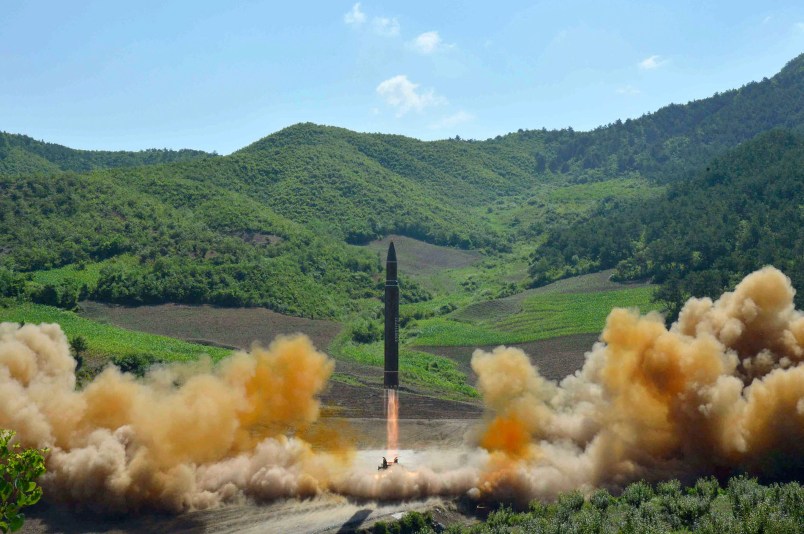 FILE- In this July 4, 2017, file photo distributed by the North Korean government shows what was said to be the launch of a Hwasong-14 intercontinental ballistic missile, ICBM, in North Korea's northwest. North Korea has been condemned and sanctioned for its nuclear ambitions, yet has still received food, fuel and other aid from its neighbors and adversaries for decades. How does the small, isolated country keep getting what it wants and needs to prevent its collapse?(Korean Central News Agency/Korea News Service via AP, File)