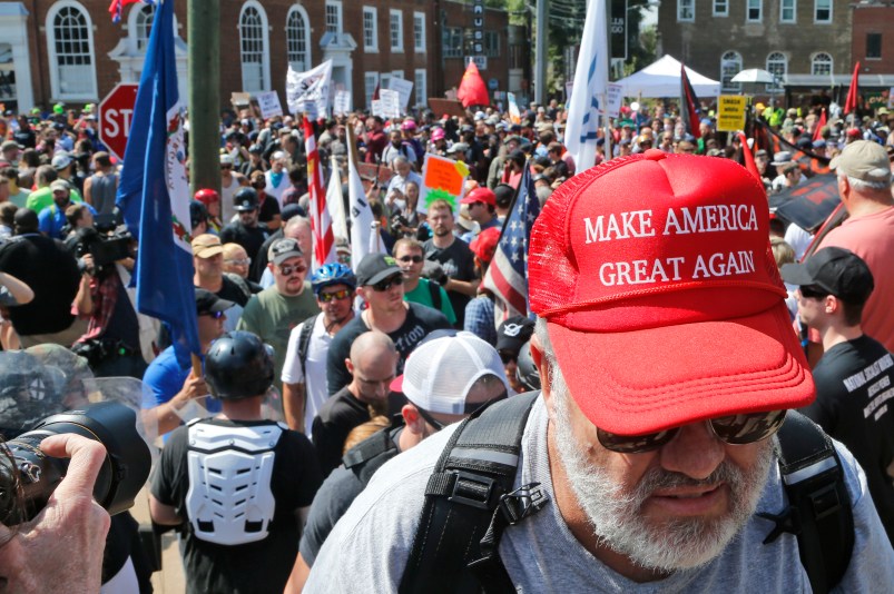 An Alt Right demonstrator walks into Lee Park in Charlottesville, Va., Saturday, Aug. 12, 2017.  (AP Photo/Steve Helber)