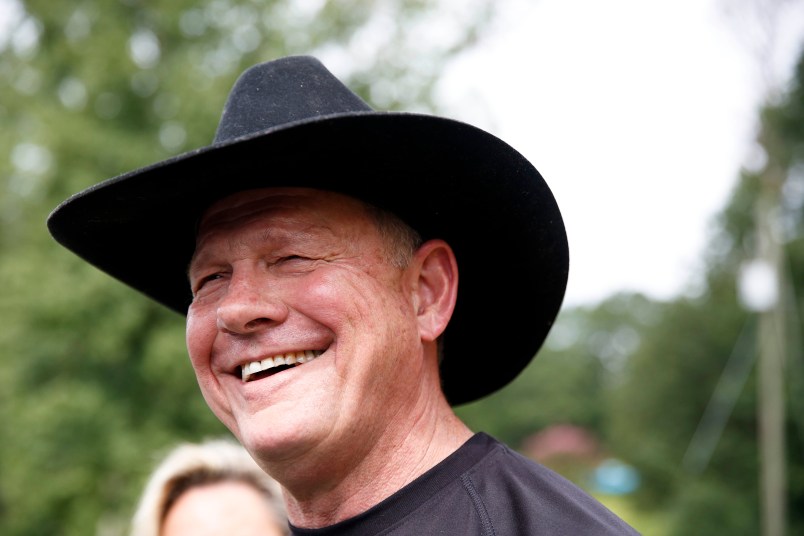 Former Alabama Chief Justice and U.S. Senate candidate Roy Moore, rides in on a horse named "Sassy" to vote a the Gallant Volunteer Fire Department, during the Alabama Senate race, Tuesday, Aug. 15, 2017, in Gallant, Ala. (AP Photo/Brynn Anderson)