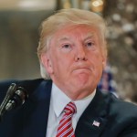 President Donald Trump pauses as he answers questions from members of the media in the lobby of Trump Tower, Tuesday, Aug. 15, 2017.  (AP Photo/Pablo Martinez Monsivais)