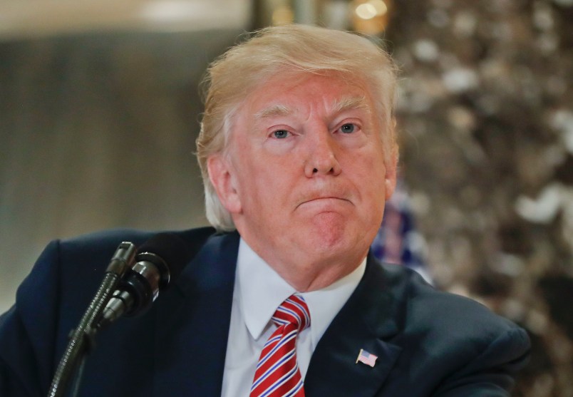President Donald Trump pauses as he answers questions from members of the media in the lobby of Trump Tower, Tuesday, Aug. 15, 2017.  (AP Photo/Pablo Martinez Monsivais)
