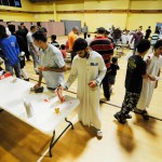 Muslims at Champions Mosque gather for a meal at an Islamic holy day celebration on Thursday, Aug. 31, 2017. Houston’s Muslim community, estimated to be at least 50,000 people, has opened many of its community centers and sent hundreds of volunteers to serve food and deliver donations. (AP Photo/Jay Reeves)