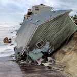 House slid into the Atlantic Ocean due to Hurricane Irma, 4000 block of South Ponte Vedra Blvd. in Ponte Vedra Beach, Fla., Monday, Sept. 11, 2017. (For The Florida Times-Union, Gary Lloyd McCullough)