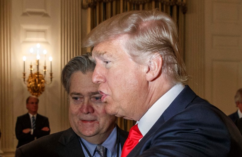 President Donald Trump talks with Cleveland Clinic President and CEO Toby Cosgrove during a meeting with business leaders in the State Dining Room of the White House in Washington, Friday, Feb. 3, 2017, in Washington. From left are, Cosgrove, White House chief strategist Steve Bannon, Trump, and Tesla and SpaceX CEO Elon Musk. (AP Photo/Evan Vucci)