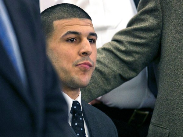 FILE - In this April 15, 2015, file photo, former New England Patriots football player Aaron Hernandez listens as the verdict is read finding him guilty in the shooting death of Odin Lloyd, at the Bristol County Superior Court in Fall River, Mass. In court documents filed Monday, May 1, 2017, prosecutors asked a judge to reject a request by attorneys for Hernandez to dismiss his murder conviction because he died before having his appeal heard. Hernandez was found hanged in his prison cell on April 19, 2017.  (Dominick Reuter/Pool Photo via AP, File)