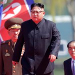 North Korean leader Kim Jong Un, second right, is accompanied by Pak Pong Ju, right, Hwang Pyong So, second left, and Choe Ryong Hae, left, as he arrives for the official opening of the Ryomyong residential area, a collection of more than a dozen apartment buildings, on Thursday, April 13, 2017, in Pyongyang, North Korea. (AP Photo/Wong Maye-E)