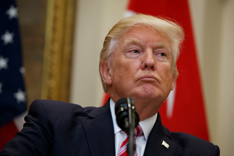President Donald Trump listens as Turkish President Recep Tayyip Erdogan speaks in the Roosevelt Room of the White House, Tuesday, May 16, 2017, in Washington. (AP Photo/Evan Vucci)
