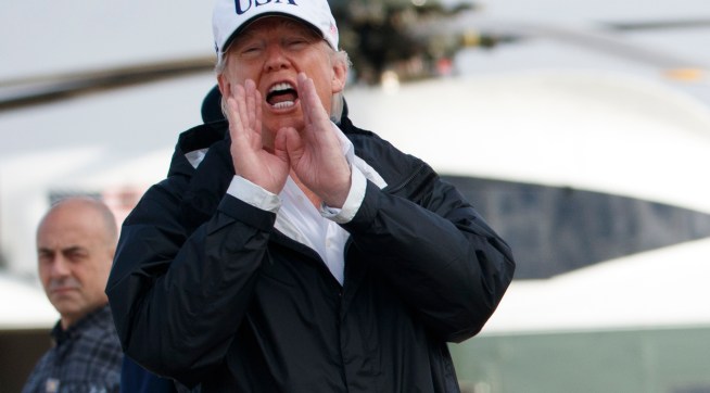 President Donald Trump and first lady Melania Trump walk to board Air Force One for a trip to Florida to meet with first responders and people impacted by Hurricane Irma, Thursday, Sept. 14, 2017, in Andrews Air Force Base, Md. (AP Photo/Evan Vucci)