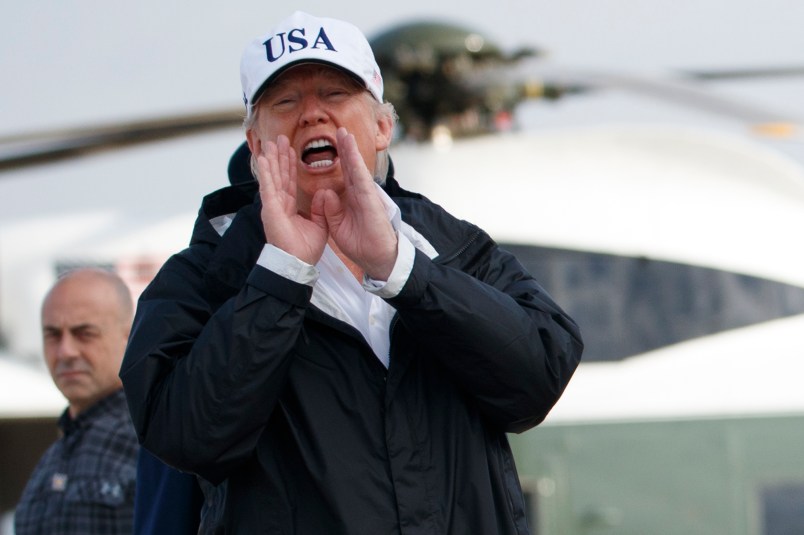 President Donald Trump and first lady Melania Trump walk to board Air Force One for a trip to Florida to meet with first responders and people impacted by Hurricane Irma, Thursday, Sept. 14, 2017, in Andrews Air Force Base, Md. (AP Photo/Evan Vucci)