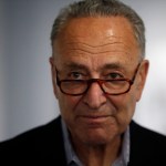 Senate Minority Leader Chuck Schumer of New York makes a brief stop at an exhibit, "Then They Came for Me: Incarceration of Japanese Americans during WWII and the Demise of Civil Liberties," chronicling the incarceration of Japanese Americans during World War II at the Alphawood Gallery, Friday, Sept. 15, 2017, in Chicago. (AP Photo/Kiichiro Sato)