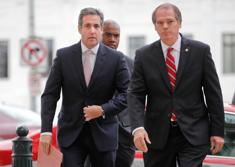Michael Cohen, left, President Donald Trump's personal attorney, arrives on Capitol Hill in Washington, Tuesday, Sept. 19, 2017. Cohen is schedule to testify before the Senate Intelligence Committee in a closed session. (AP Photo/Pablo Martinez Monsivais)