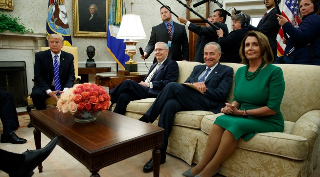 President Donald Trump meets with, from left, Senate Majority Leader Mitch McConnell, R-Ky., Senate Minority Leader Chuck Schumer, D-N.Y., and House Minority Leader Nancy Pelosi, D-Calif., and other Congressional leaders in the Oval Office of the White House, Wednesday, Sept. 6, 2017, in Washington. (AP Photo/Evan Vucci)
