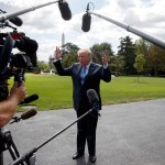 President Donald Trump talks to reporters as he walks to board Marine One on the South Lawn of the White House, Wednesday, Sept. 27, 2017, in Washington. (AP Photo/Evan Vucci)